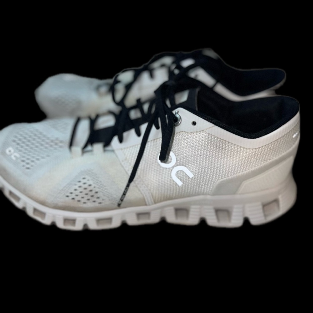 On Running White and Black Athletic Shoes